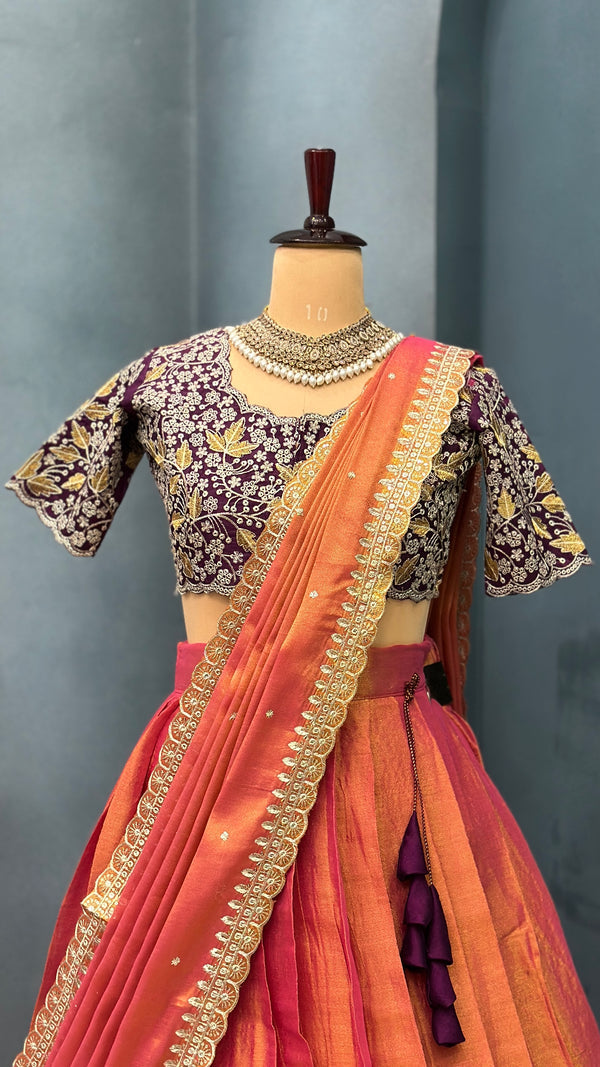 Double shade tissue silk lehenga with rich wine embroidered blouse