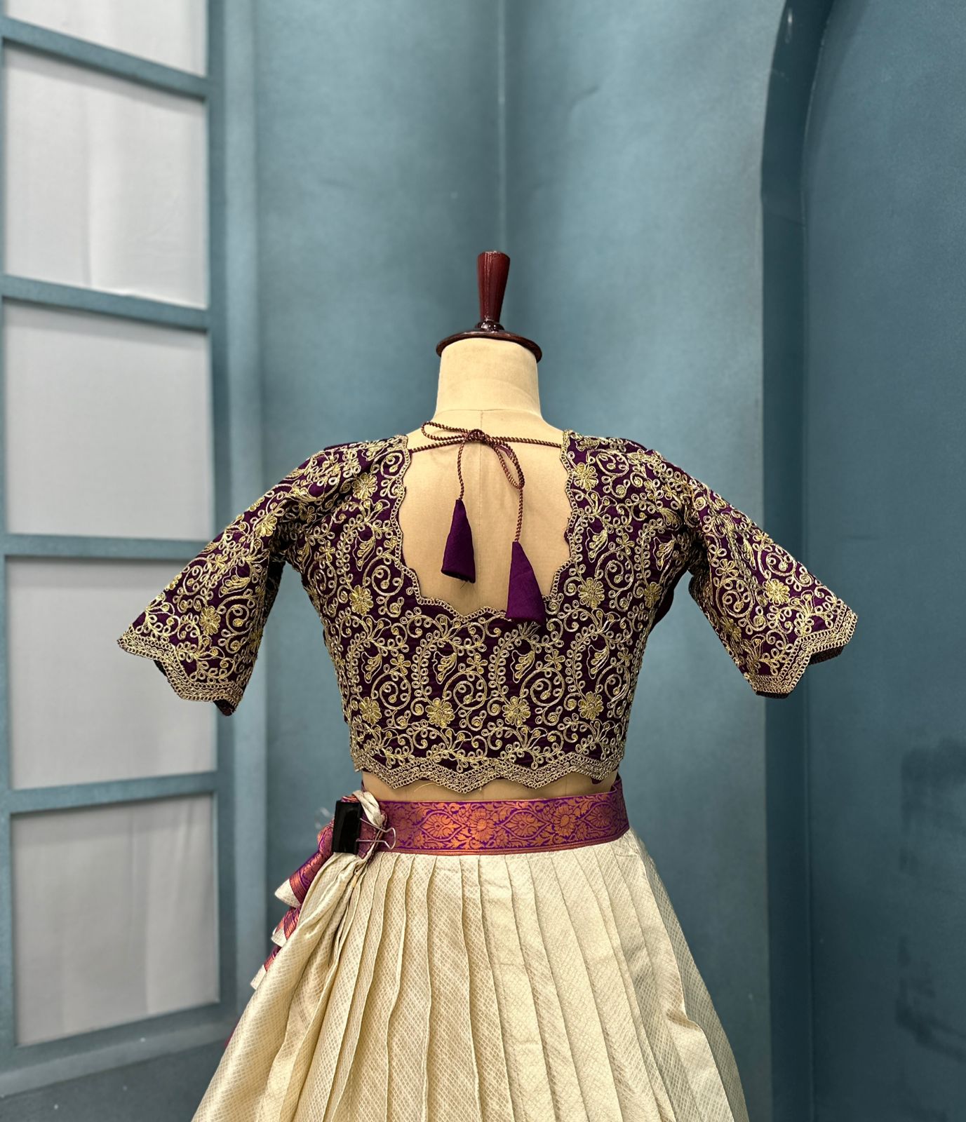 Kanchipattu SILK &nbsp;full stiched Lehenga CREAM AND WINE