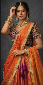 Double shade tissue silk lehenga with rich wine embroidered blouse