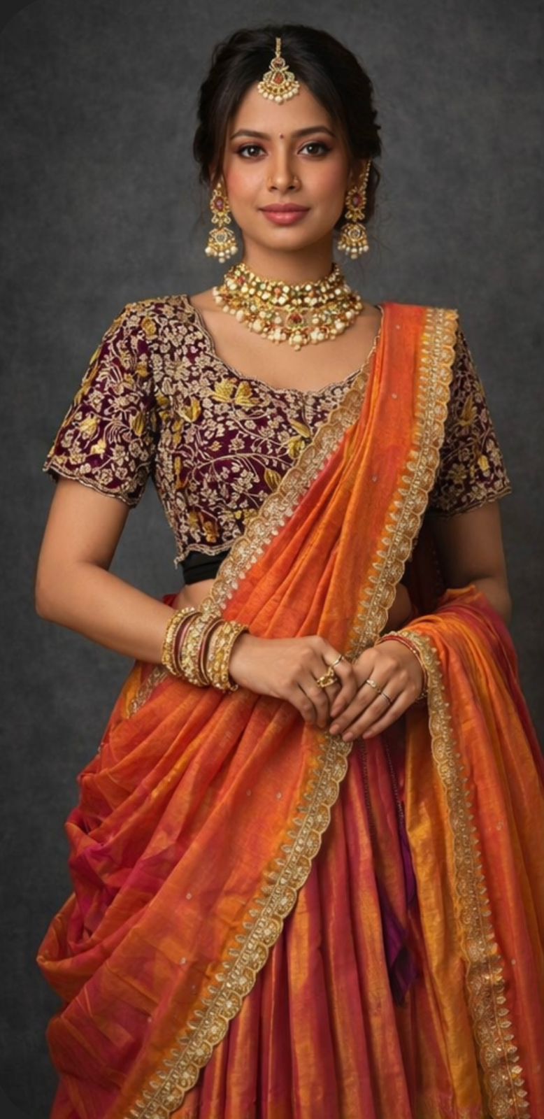 Double shade tissue silk lehenga with rich wine embroidered blouse