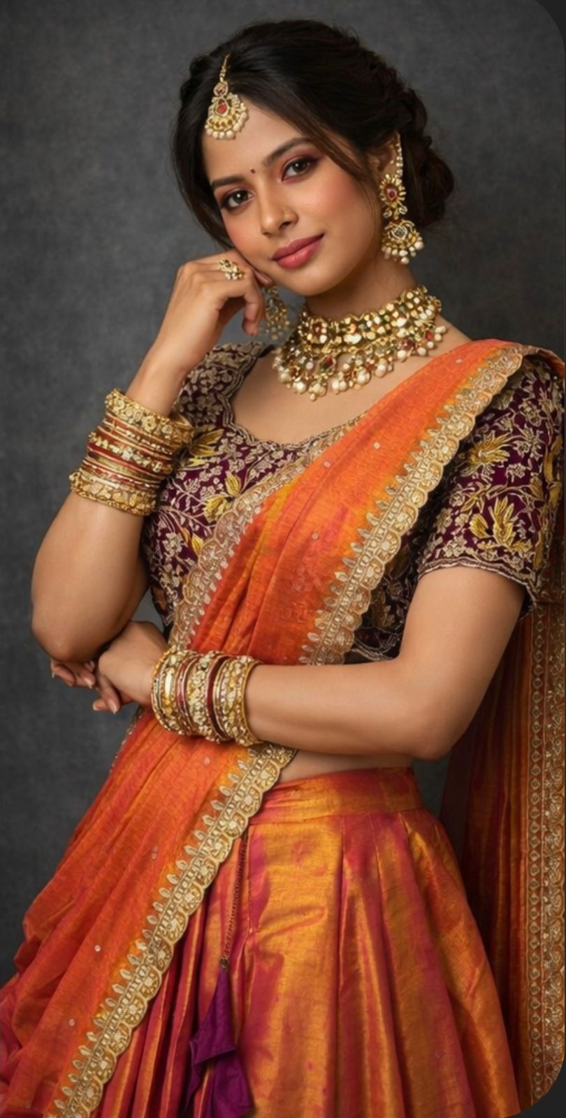 Double shade tissue silk lehenga with rich wine embroidered blouse