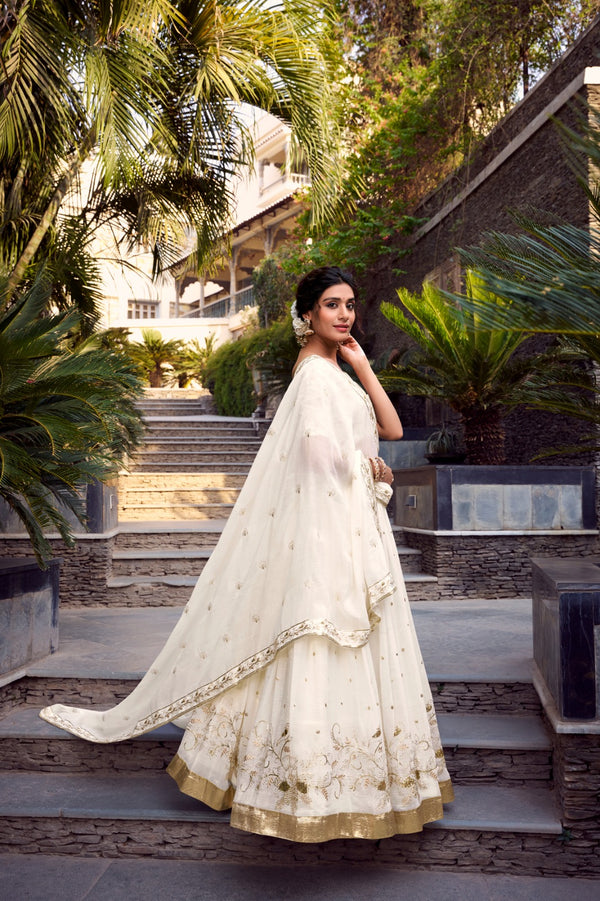 Off-white glam with intricate glossy dance Unstitched Lehengas